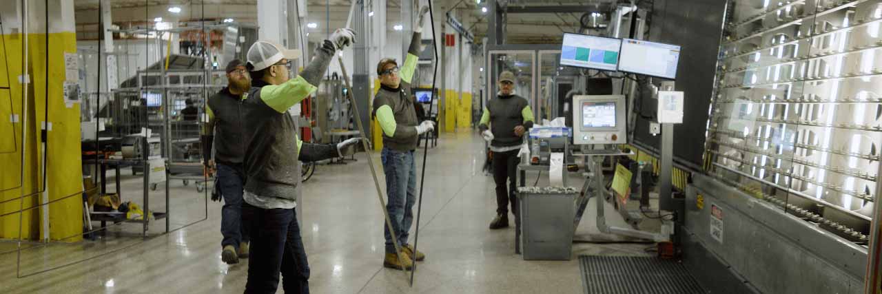 Cardinal employees working together Cardinal employees working together